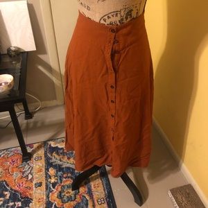 High waisted rust skirt mid calf length